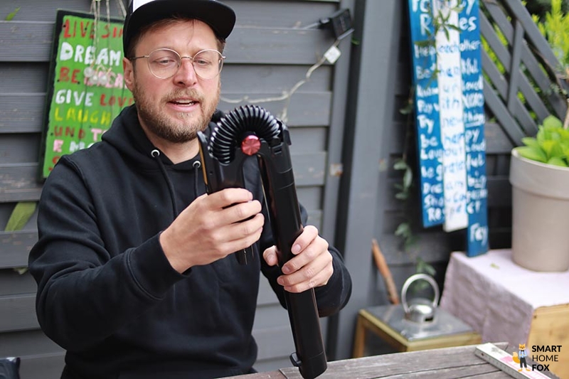 You can see the suction tube of the Shark Anti Hair Wrap hoover.